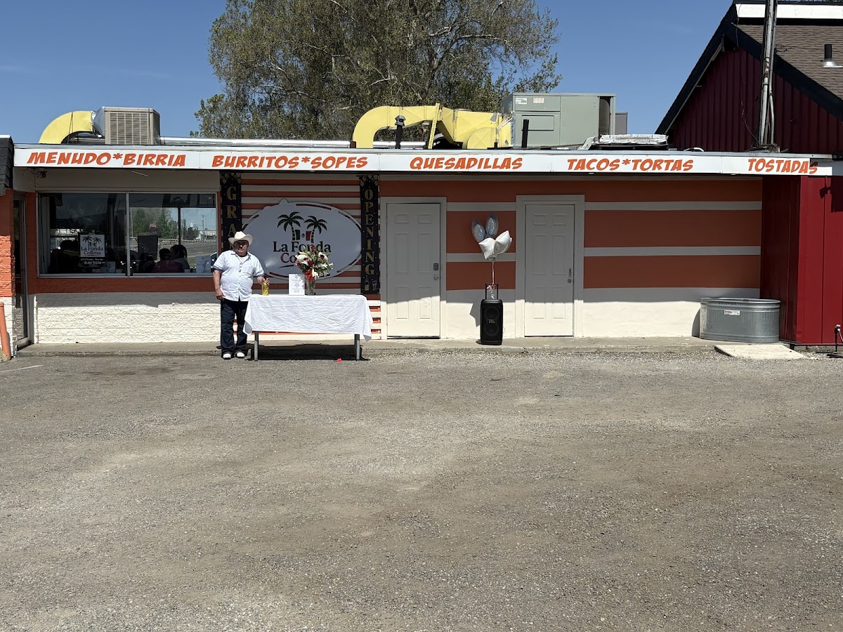 La Fonda Colima storefront in Pasco with the menu painted across the building